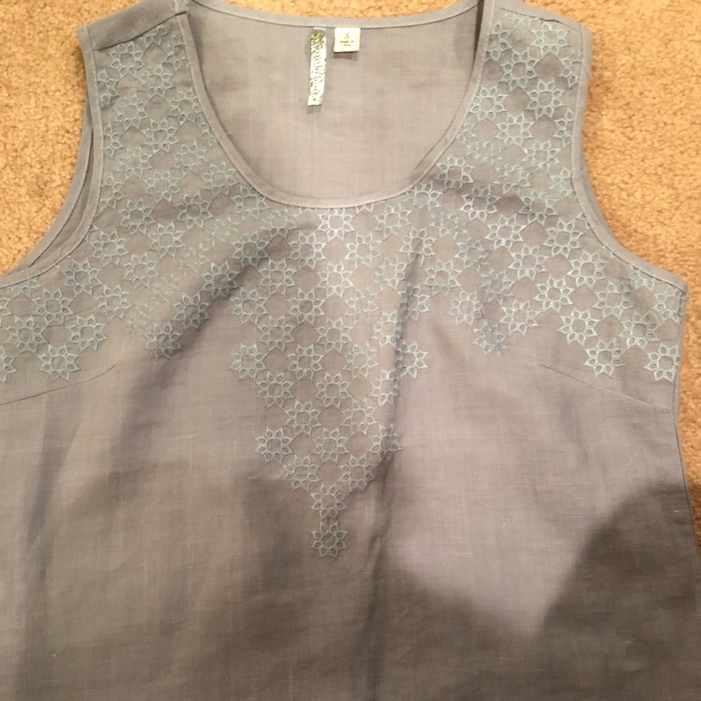 A blue, detailed tank top